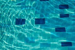 Overhead view of blue water surface abstract in a pool photo