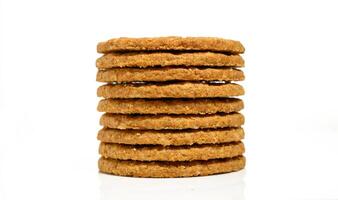 Stack of biscuit cookies stack isolated on white background photo