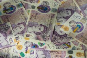 British currency - close up of the new 2016 polymer five pound note with enhanced counterfeit resilience. 1 photo