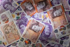 British currency - close up of the new 2016 polymer five pound note with enhanced counterfeit resilience. 3 photo