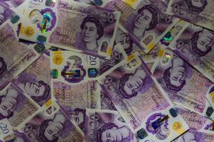 British currency - close up of the new 2016 polymer five pound note with enhanced counterfeit resilience. 2 photo