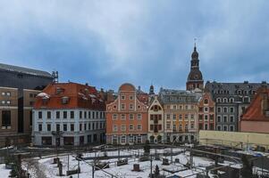 For tourists, medieval architecture of old Riga town can offer unforgettable atmosphere of the Middle Ages and unique Gothic architecture photo