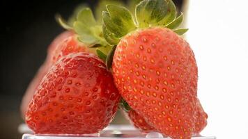 Strawberries rotating. Close up. Loop video
