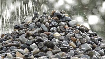 Pebbles and stones falling over a mountain in a quarry video