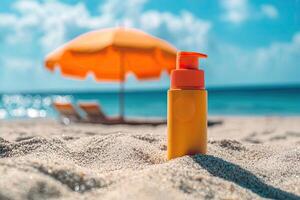 Sunscreen bottle on sandy beach with umbrella and blue sky background. Summer vacation concept photo