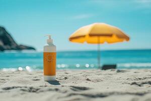Sunscreen bottle on sandy beach with umbrella and blue sky background. Summer vacation concept photo