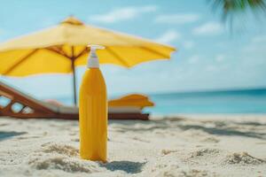 Sunscreen bottle on sandy beach with umbrella and blue sky background. Summer vacation concept photo