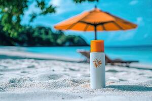 Sunscreen bottle on sandy beach with umbrella and blue sky background. Summer vacation concept photo