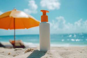 Sunscreen bottle on sandy beach with umbrella and blue sky background. Summer vacation concept photo