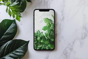 Smartphone with blank screen placed on background surface photo