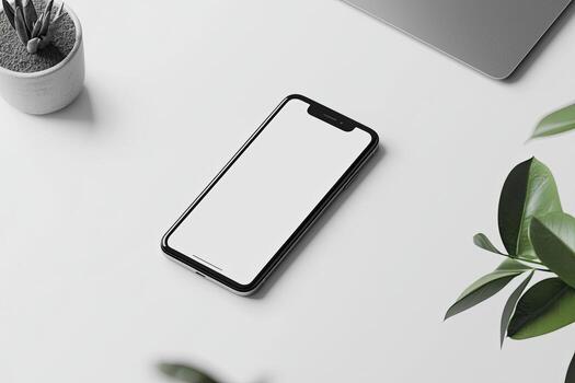 Smartphone with blank screen placed on background surface photo