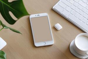 Smartphone with blank screen placed on background surface photo