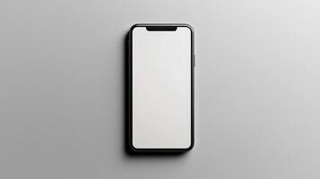 Smartphone with blank screen placed on background surface photo