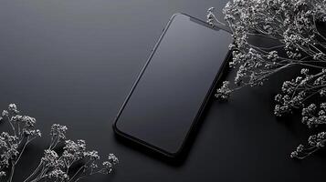 Smartphone with blank screen placed on background surface photo