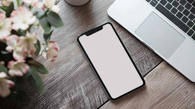 Smartphone with blank screen placed on background surface photo