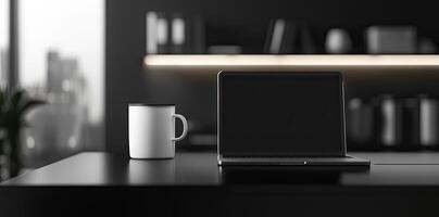 Laptop and coffee cup on black table in office. Workplace concept photo