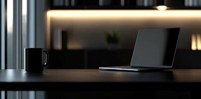 Laptop and coffee cup on black table in office. Workplace concept photo