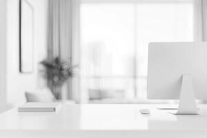 Blurred office background with a computer and white desk in a modern interior, a business work space concept, a mockup for product display presentation, with a white background photo