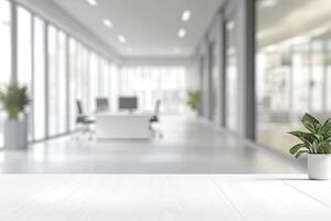 Blurred office background with a computer and white desk in a modern interior, a business work space concept, a mockup for product display presentation, with a white background photo