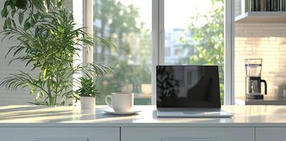 Blurred background of a modern home office interior with a laptop computer and a coffee cup on a white table, with copy space for text in the blurred window view. Business work from home concep photo