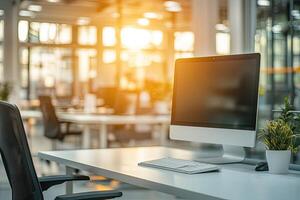 Minimalist white desk with a computer and office background, blurred business center interior in the blurred background. Mockup for design or presentation photo