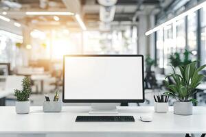 Minimalist white desk with a computer and office background, blurred business center interior in the blurred background. Mockup for design or presentation photo