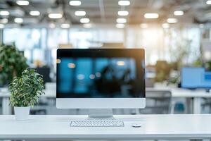 Minimalist white desk with a computer and office background, blurred business center interior in the blurred background. Mockup for design or presentation photo