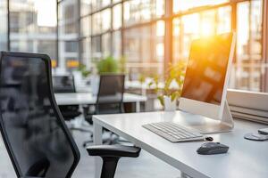 Minimalist white desk with a computer and office background, blurred business center interior in the blurred background. Mockup for design or presentation photo