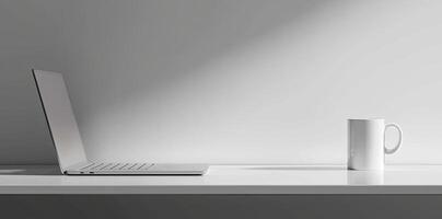 Minimalist white office desk with laptop and coffee mug on a blurred background, with space for text, representing the concept of working from home photo