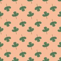 Seamless pattern with small leaves on a beige background vector