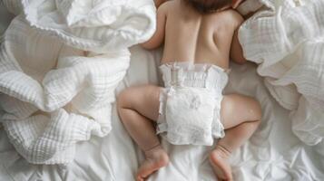 Cute small little newborn baby wearing a diaper. Baby in diaper pants photo