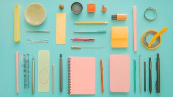 A trendy flat lay of stylish stationery on a vibrant backdrop, perfect for workspace inspiration photo