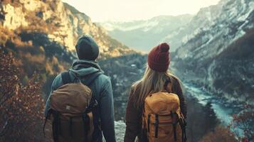 Couple traveling together and exploring new places. Beautiful couple walking with backpacks photo