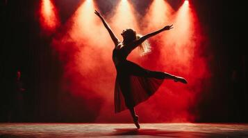 Dynamic dance performance in theater. Artistic performance in theater ambiance. Modern dance photo