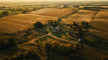 Aerial view of sprawling agricultural landscape with neatly arranged fields. Farmland photo
