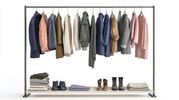 Stylish outfits displayed on a clothing rack. Collection of fashionable clothes photo