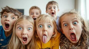 Children making silly and goofy faces, capturing the expressive gestures of their facial expressions photo