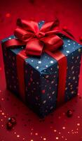 A blue box with a red bow on top of it. The box is decorated with stars and is sitting on a red background photo