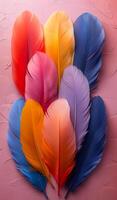 A colorful array of feathers are arranged in a row. The feathers are of different colors, including red, orange, yellow, blue, and purple. Concept of vibrancy and diversity photo