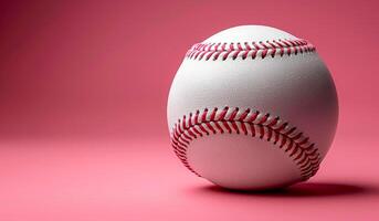 A white baseball with red stitching on the side. The ball is sitting on a pink background. Concept of nostalgia and simplicity, as it is a classic image of a baseball photo