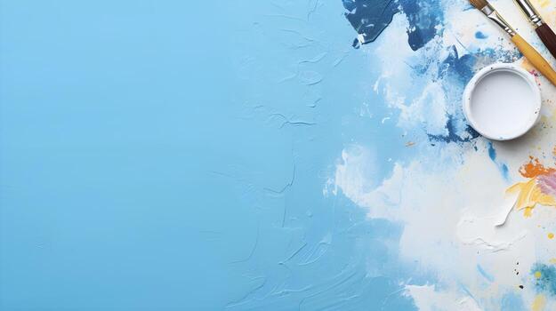 Assorted Painting Tools Including Brushes, Spatula, and Roller photo