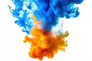 Vibrant blue and orange ink swirls creating beautiful patterns in water photo