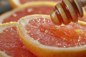 Sliced grapefruit with drizzled honey showcasing a fresh and tangy flavor combination photo