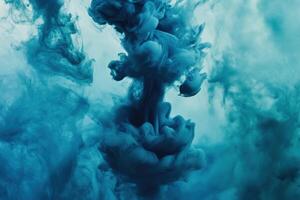 Swirling blue ink cloud underwater creating mesmerizing patterns and textures in tranquil waters photo