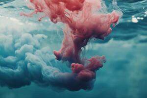 Colorful ink swirls blend in water, showcasing beautiful abstract patterns during the art project photo