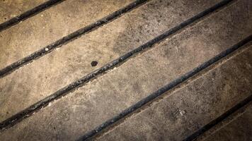 Curb side walkway concrete lines grunge background, dirt, dark, dirty slum background good for multimedia content photo