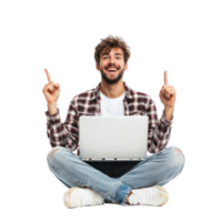 Happy young man sitting cross-legged with a laptop in the air, hand pointing at left empty space front view isolate on transparent background png
