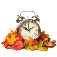 Alarm clock on colorful autumn leaves front view isolate on transparent background png