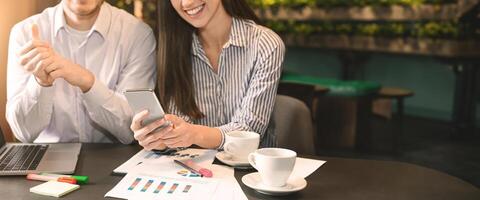 Mobile application development. Cheerful woman enjoying demo version of new project, business meeting in cafe, empty space, cropped photo