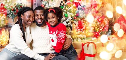 Merry Christmas and happy holidays. Portrait of joyful african american family of three posing in Xmas interior photo